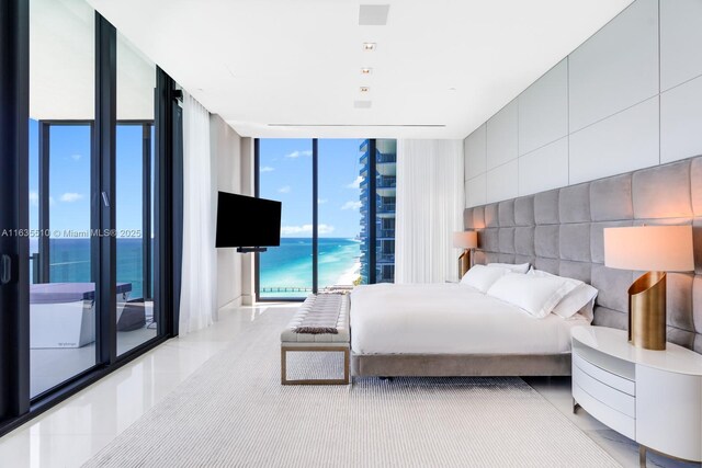 17141 Collins Ave Unit 2501, Sunny Isles Beach, FL 33160 - tiled bedroom featuring access to exterior and floor to ceiling windows