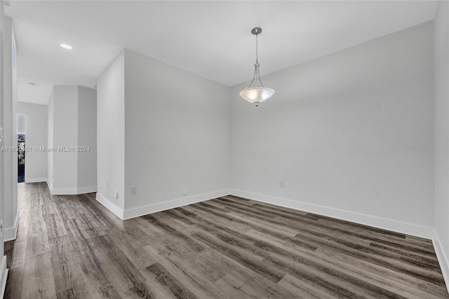 unfurnished room featuring hardwood / wood-style floors