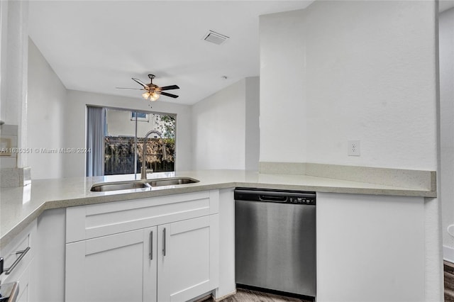 kitchen with stainless steel dishwasher, white cabinets, ceiling fan, and light hardwood / wood-style flooring