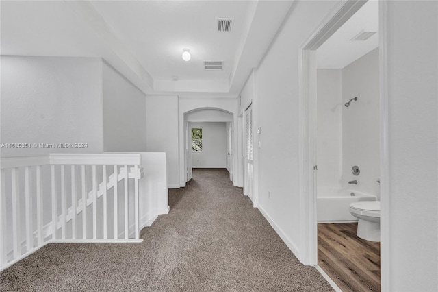 hallway featuring hardwood / wood-style flooring