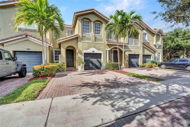 view of front of property with a garage