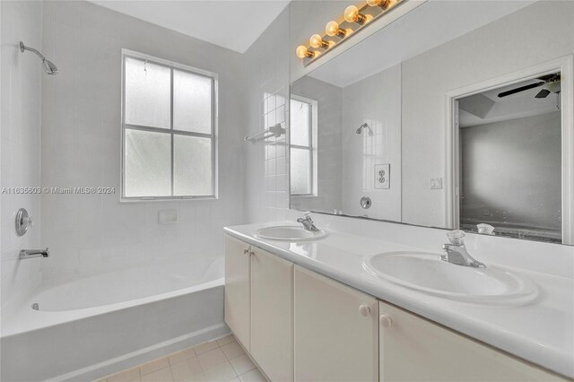 bathroom featuring dual vanity, tile patterned floors, ceiling fan, and plenty of natural light