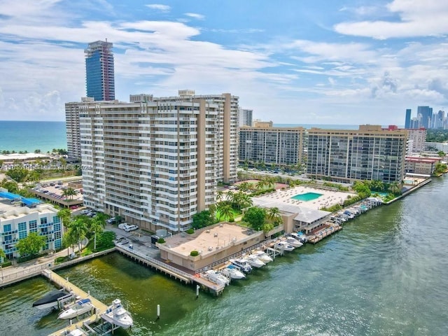 aerial view featuring a water view and a city view