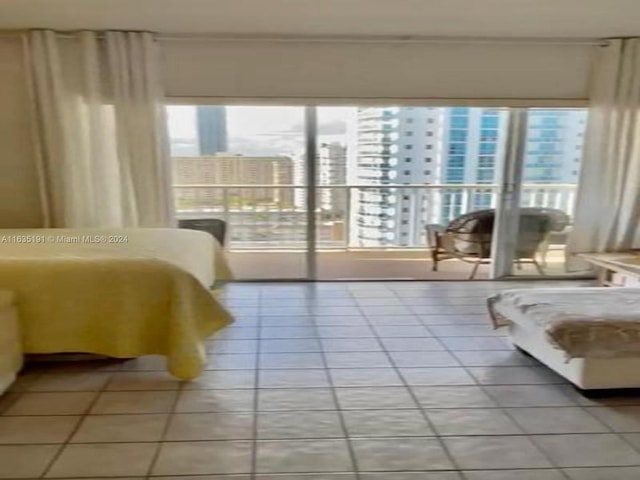 bedroom featuring light tile patterned floors