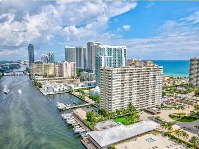 aerial view with a view of city and a water view