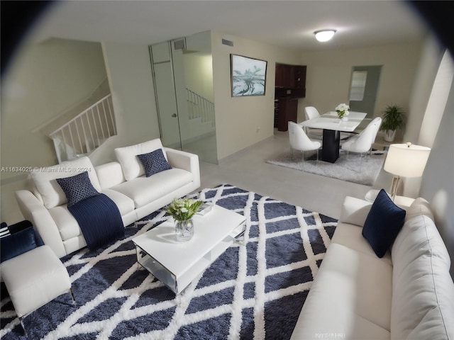 living room featuring concrete floors