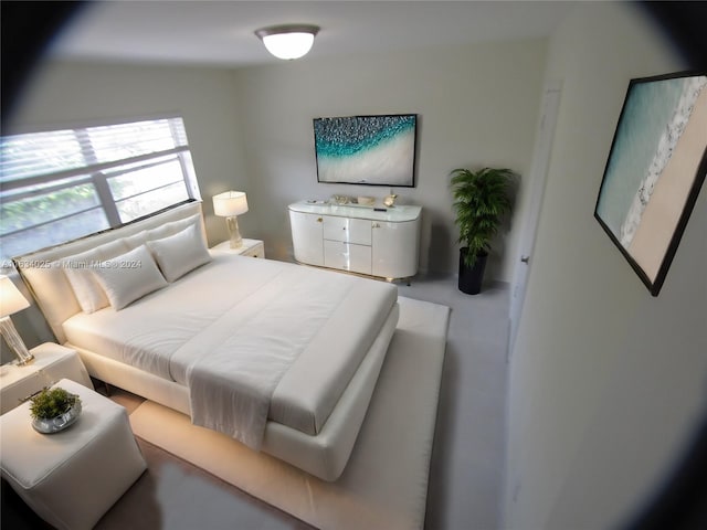 bedroom featuring lofted ceiling