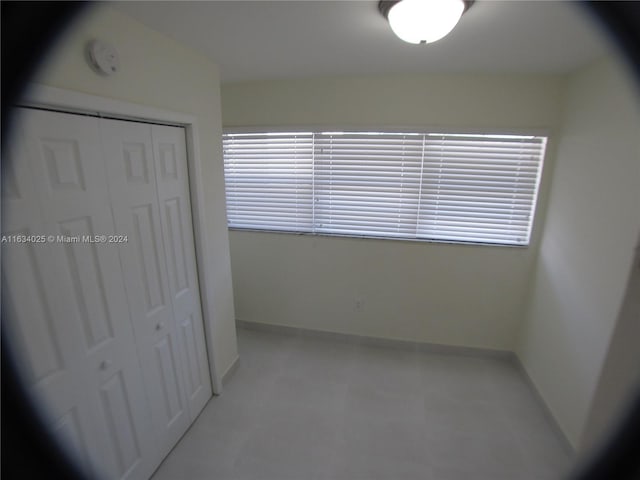 unfurnished bedroom featuring a closet