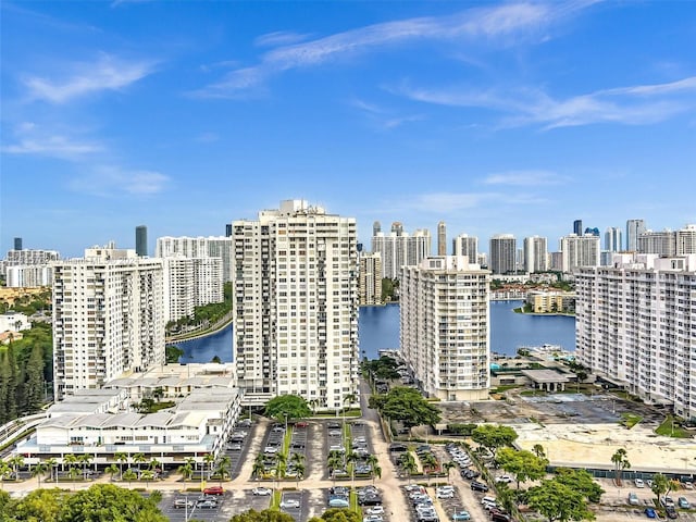 bird's eye view featuring a view of city and a water view