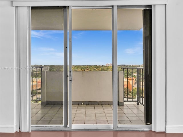 doorway featuring tile patterned floors