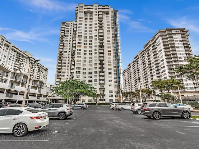 view of property with uncovered parking