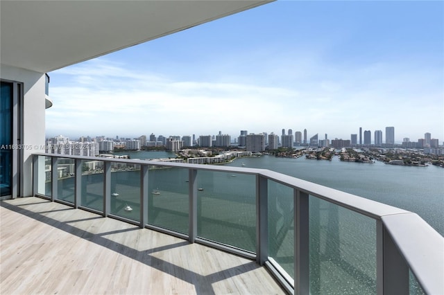 balcony with a city view and a water view