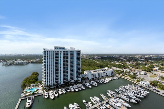 bird's eye view featuring a water view and a view of city