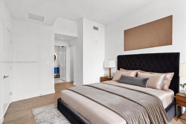 bedroom featuring light wood-type flooring