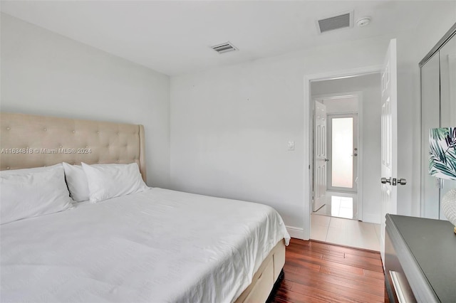 bedroom featuring hardwood / wood-style flooring