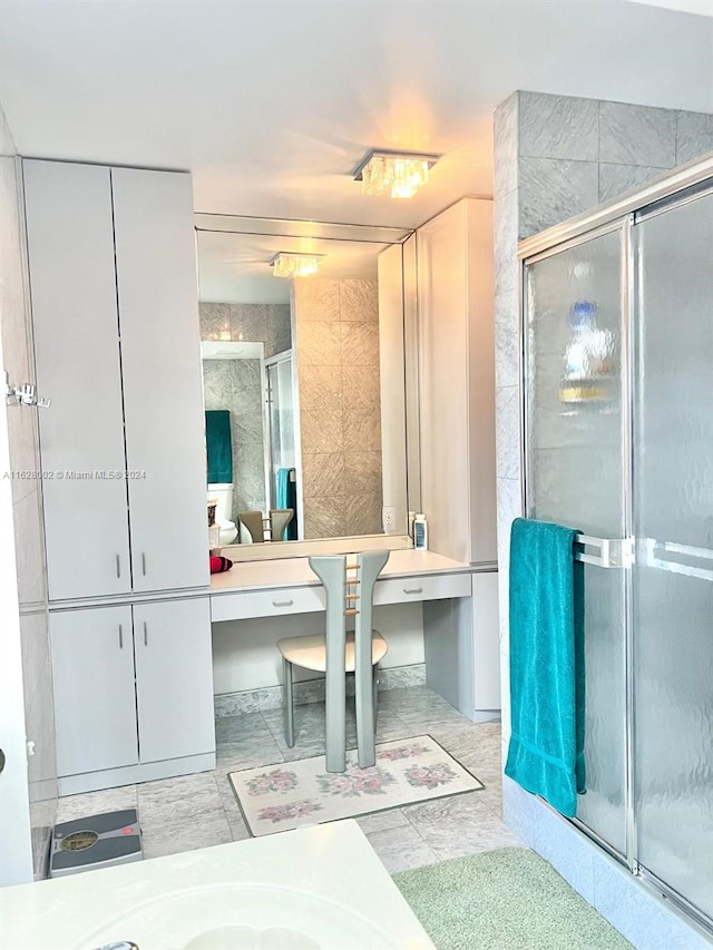 bathroom with an enclosed shower