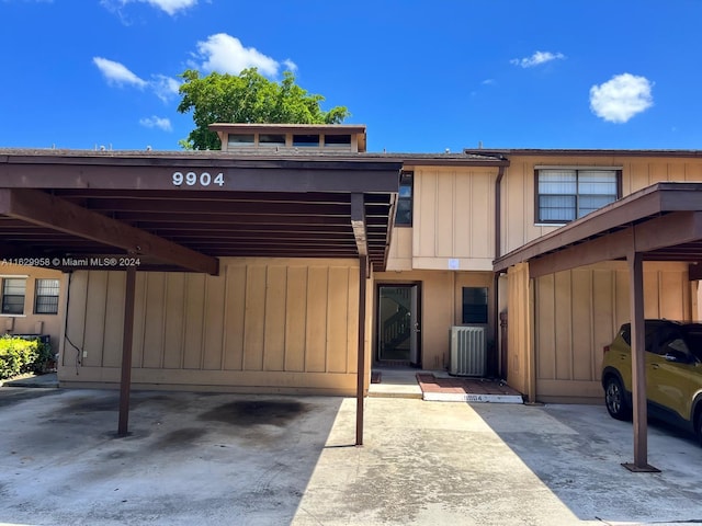 exterior space featuring a carport