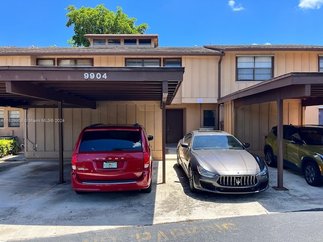 view of front of home featuring a carport