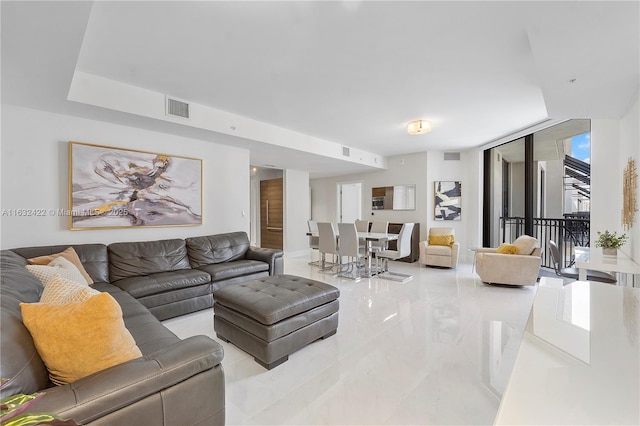 living room featuring expansive windows