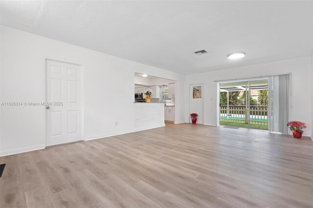 entrance foyer with light hardwood / wood-style floors