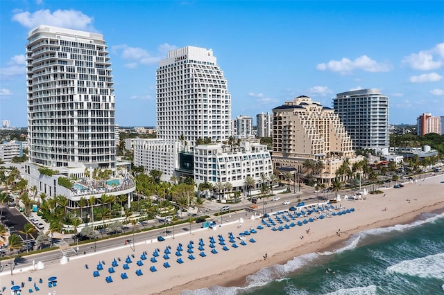 city view featuring a water view and a beach view