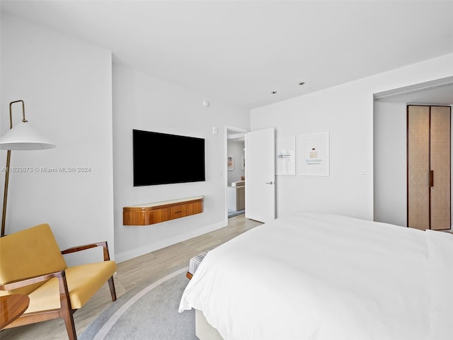 bedroom featuring light wood-type flooring