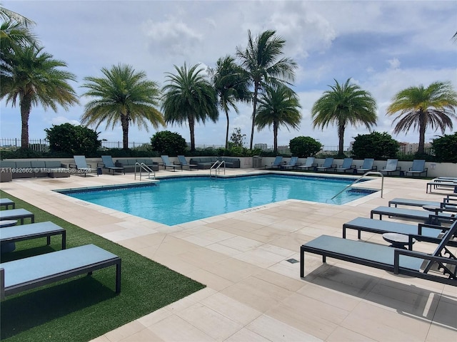 view of swimming pool featuring a patio