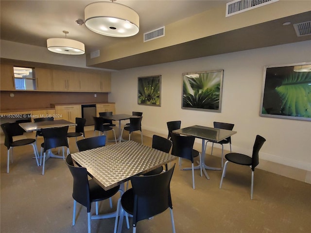 3000 Coral Way Unit 1121, Miami, FL 33145 - dining space with light carpet and baseboards