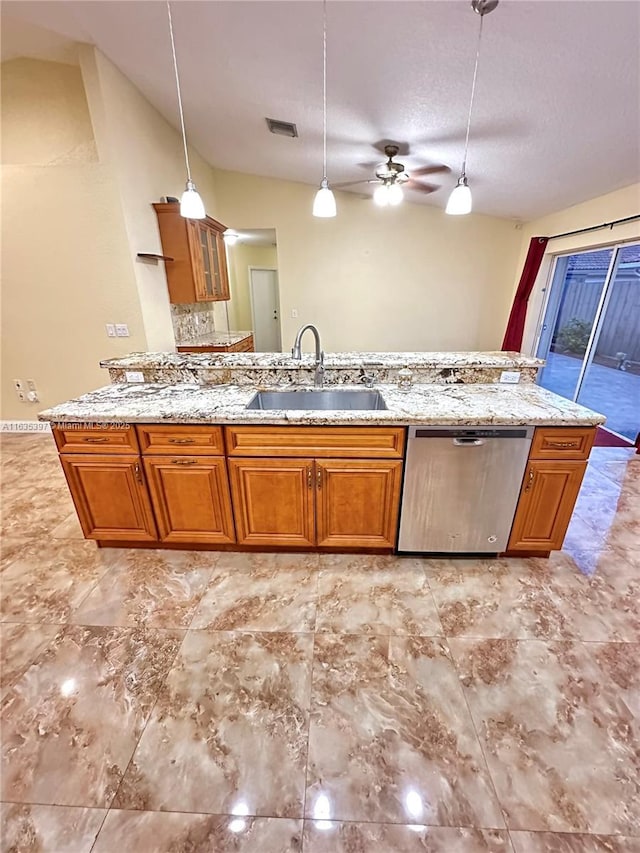 kitchen featuring dishwasher, decorative light fixtures, ceiling fan, and sink