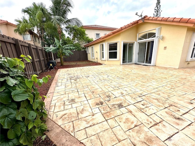 back of house with a patio area