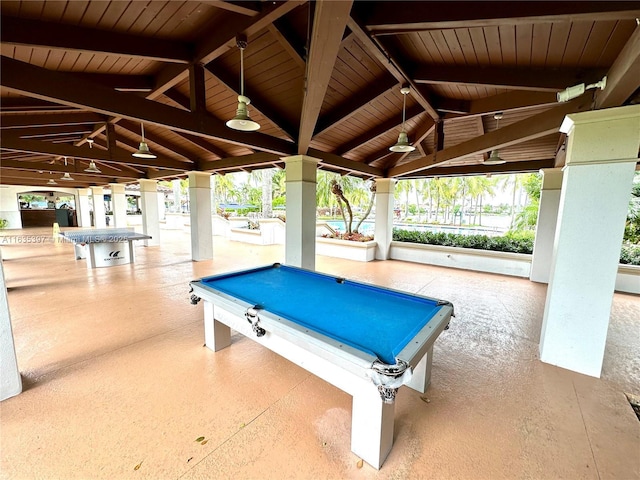 game room with vaulted ceiling with beams, wooden ceiling, and pool table