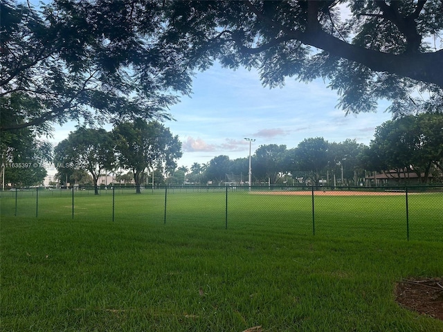 surrounding community featuring a lawn