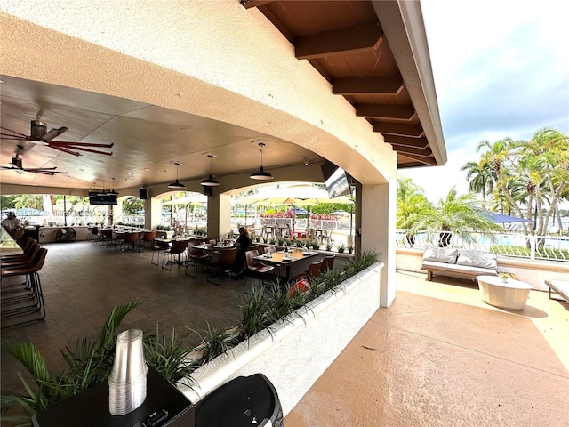 view of patio / terrace with ceiling fan