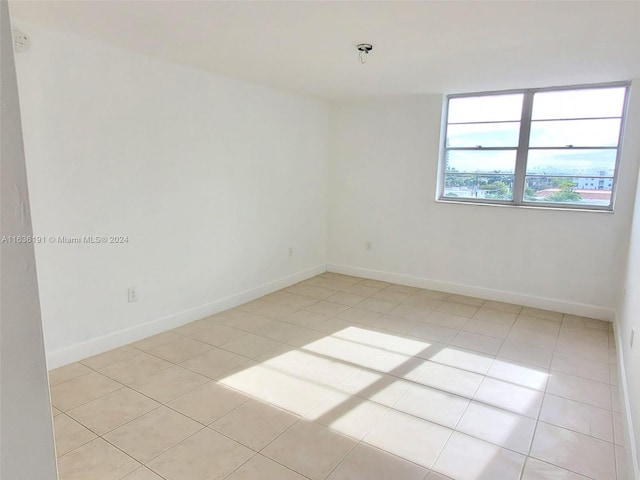 view of tiled spare room