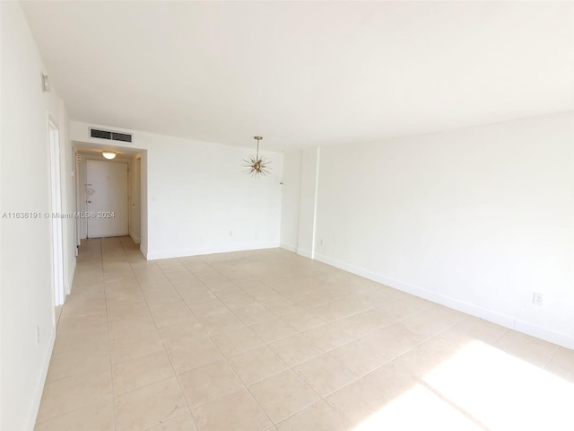 7900 Tatum Waterway Dr Unit 502, Miami Beach, FL 33141 - unfurnished room featuring light tile patterned floors, visible vents, and baseboards