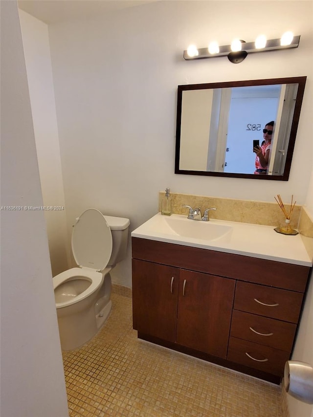 7900 Tatum Waterway Dr Unit 502, Miami Beach, FL 33141 - bathroom featuring toilet and vanity