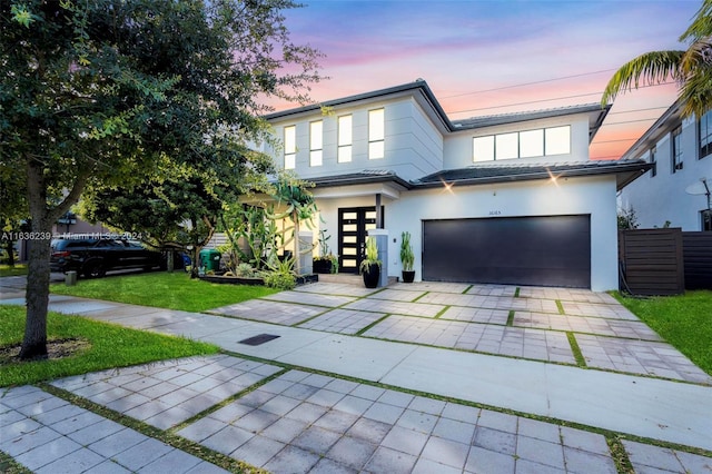 view of front of home featuring a garage