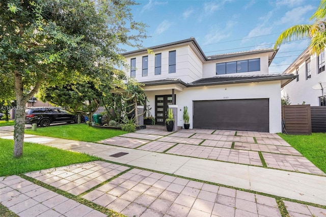 view of front of home with a garage