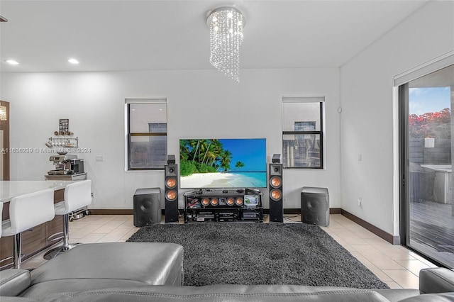 tiled living room featuring a notable chandelier