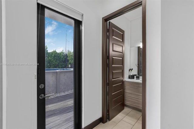 doorway to outside featuring light hardwood / wood-style flooring