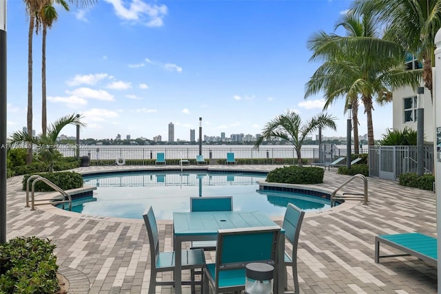 view of pool featuring a patio