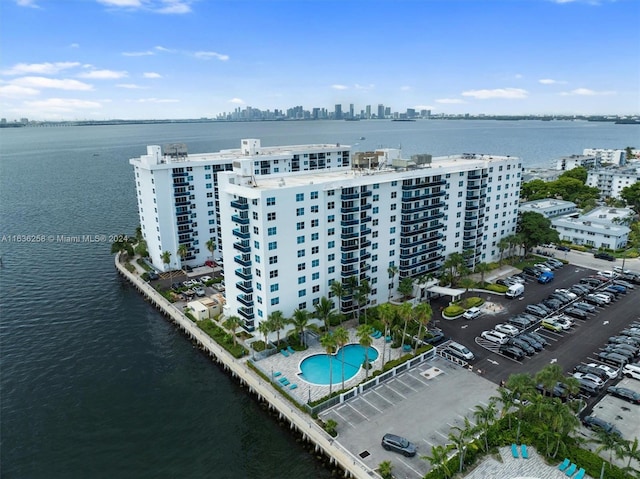 birds eye view of property featuring a water view