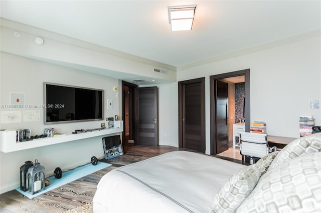 bedroom featuring hardwood / wood-style flooring