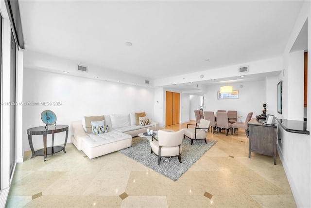 living room featuring light tile patterned flooring