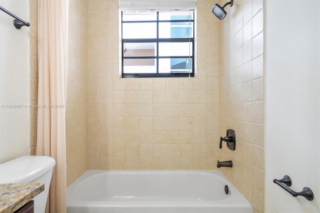 bathroom featuring toilet and shower / bathtub combination with curtain