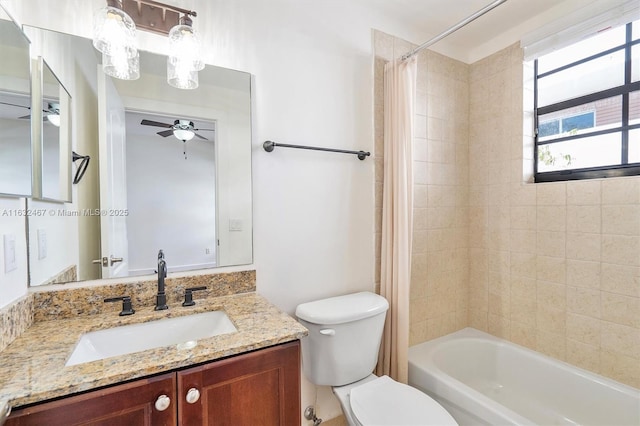 full bathroom with vanity, ceiling fan, toilet, and shower / tub combo with curtain