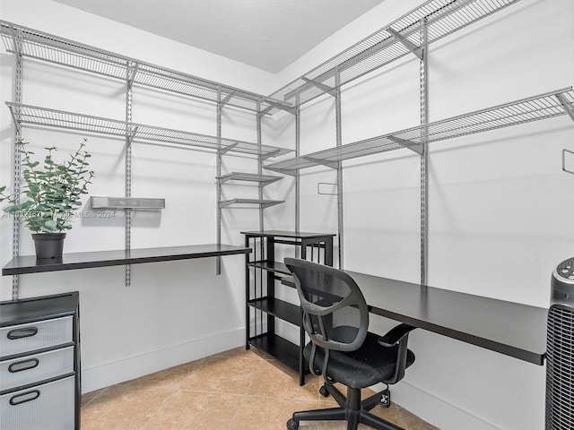 home office featuring light tile patterned floors