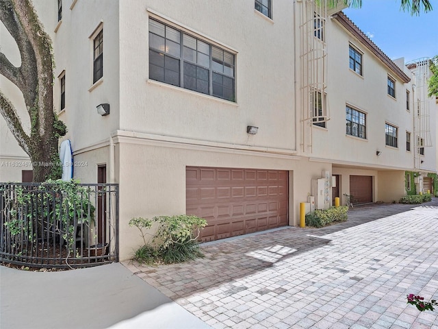 view of building exterior with a garage