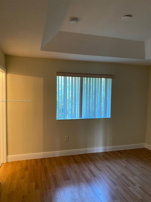 1519 SE 24th Ct Unit 238, Homestead, FL 33035 - empty room featuring wood finished floors and baseboards