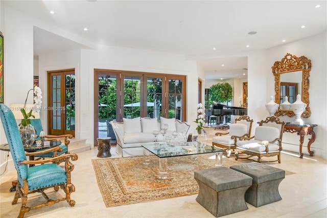 living area featuring french doors and recessed lighting